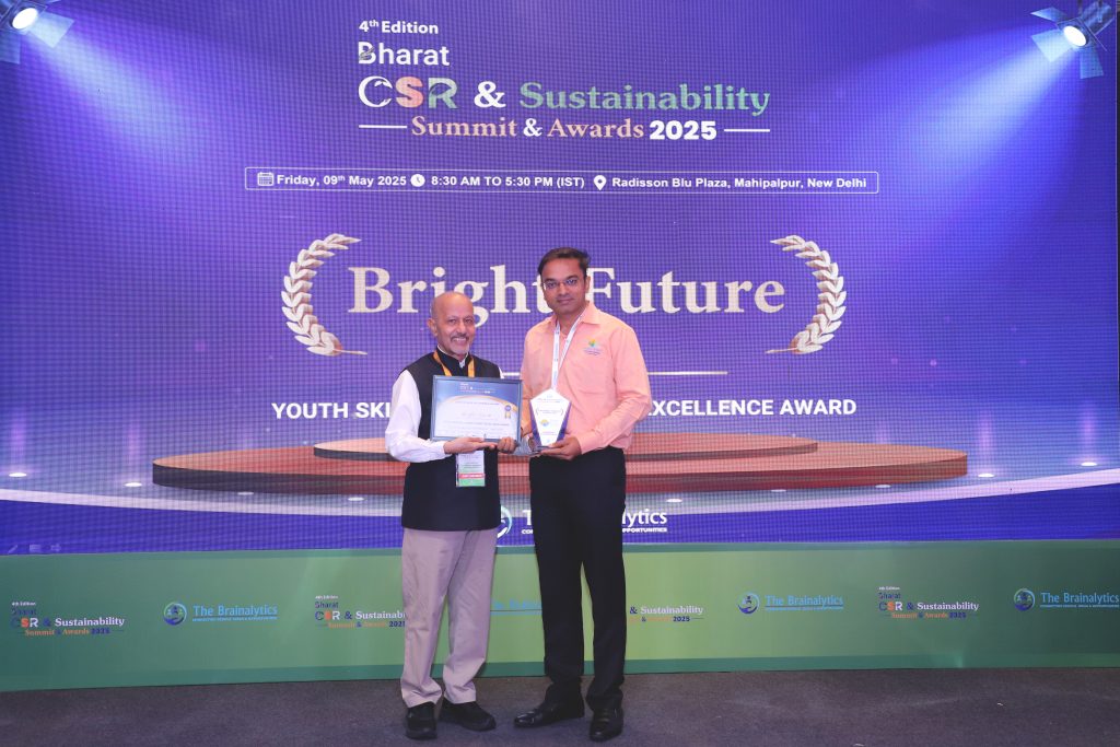 Kishor Receiving Award